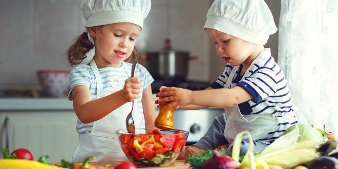 Children learning to prepare nutritious food.