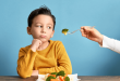 Experts say vegan children obtaining food from meat-eating families could face nutritional deficiencies or crave restricted items.